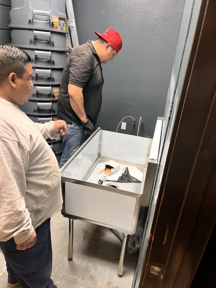 Commercial plumbing and sink installation in Crossroads